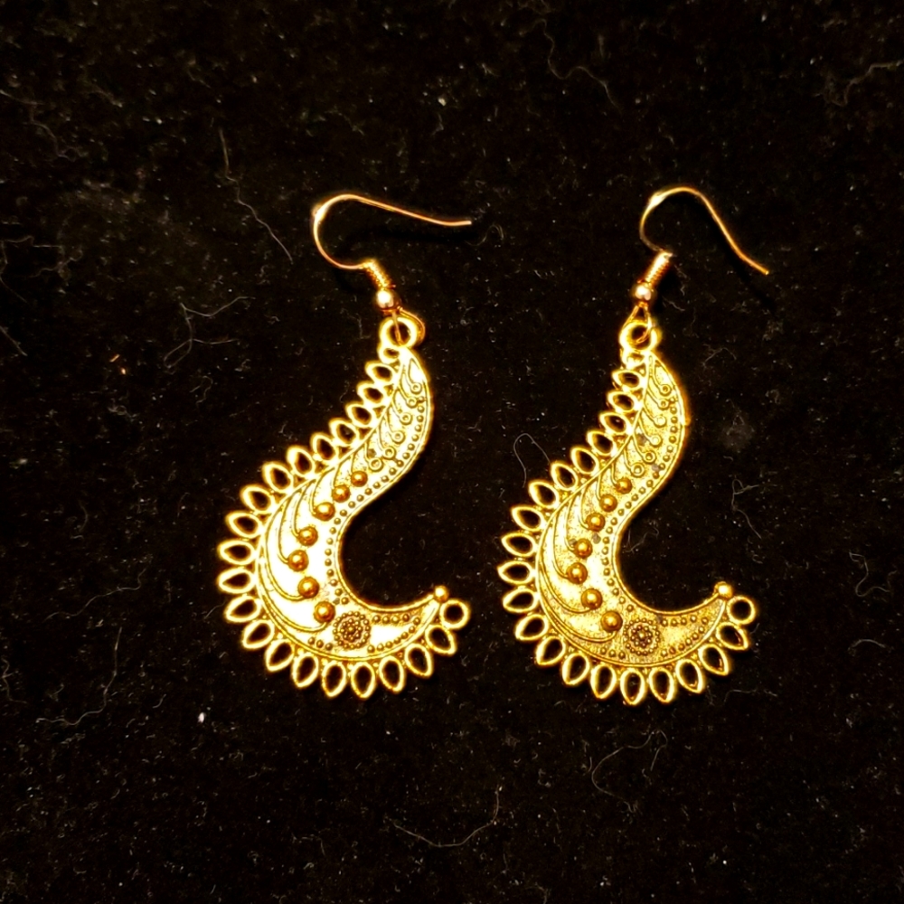 Golden metal earrings